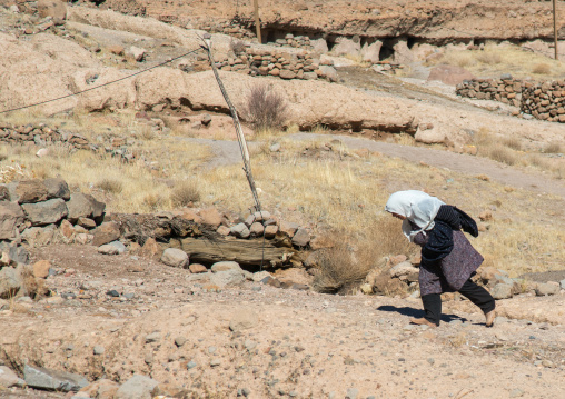 old widow woman in the troglodyte village, Kerman province, Meymand, Iran