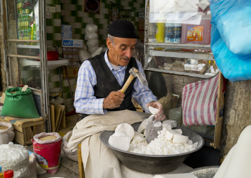 Men Crashing Sugar In The Bazaar, Sanandaj, Iran