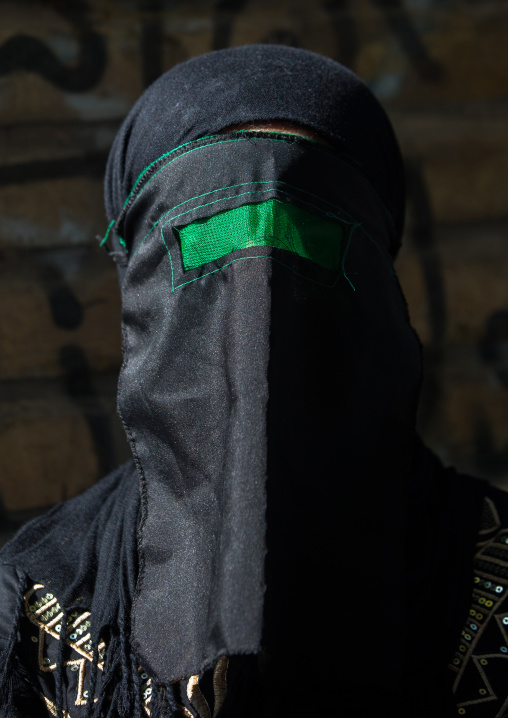 Iranian Shiite Muslim Woman Mourning Imam Hussein On The Day Of Tasua With Her Face Covered By A Green Veil, Lorestan Province, Khorramabad, Iran