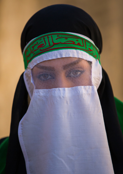 Iranian Shiite Muslim Woman Mourning Imam Hussein On The Day Of Tasua With Her Face Covered By A Veil, Lorestan Province, Khorramabad, Iran