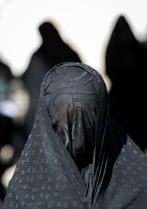Iranian Shiite Muslim Woman Mourning Imam Hussein On The Day Of Tasua With Her Face Covered By A Veil, Lorestan Province, Khorramabad, Iran