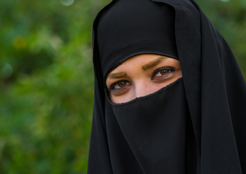 A Shiite Muslim Woman Wearing A Niqab Mourning Imam Hussein On The Day Of Tasua, Lorestan Province, Khorramabad, Iran