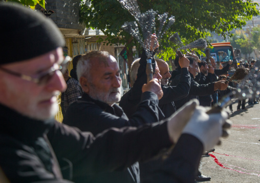 Iranian Shiite Men Are Beating Themselves With Iron Chains To Commemorate Ashura, The Day Of The Death Of Imam Hussein, Kurdistan Province, Bijar, Iran