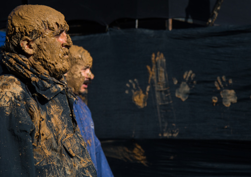 Iranian Shiite Muslim Men Covered In Mud During Ashura Day, Kurdistan Province, Bijar, Iran