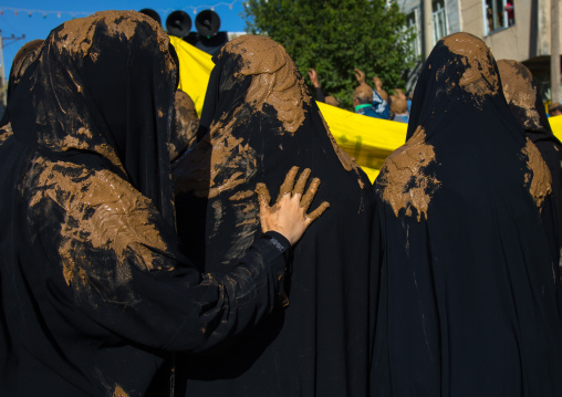 Iranian Shiite Muslim Women Covered In Mud, Chanting And Self-flagellating During Ashura, The Day Of The Death Of Imam Hussein, Kurdistan Province, Bijar, Iran