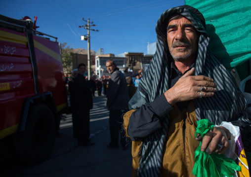 Iranian Shiite Muslim Man With Hand On His Heart During Ashura, The Day Of The Death Of Imam Hussein, Kurdistan Province, Bijar, Iran