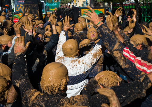 Iranian Shiite Muslim Men Covered In Mud, Chanting And Self-flagellating During Ashura, The Day Of The Death Of Imam Hussein, Kurdistan Province, Bijar, Iran