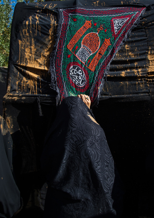 Iranian Shiite Muslim Women Covered In Mud Crying In Front Of A Coffin During Ashura, The Day Of The Death Of Imam Hussein, Kurdistan Province, Bijar, Iran