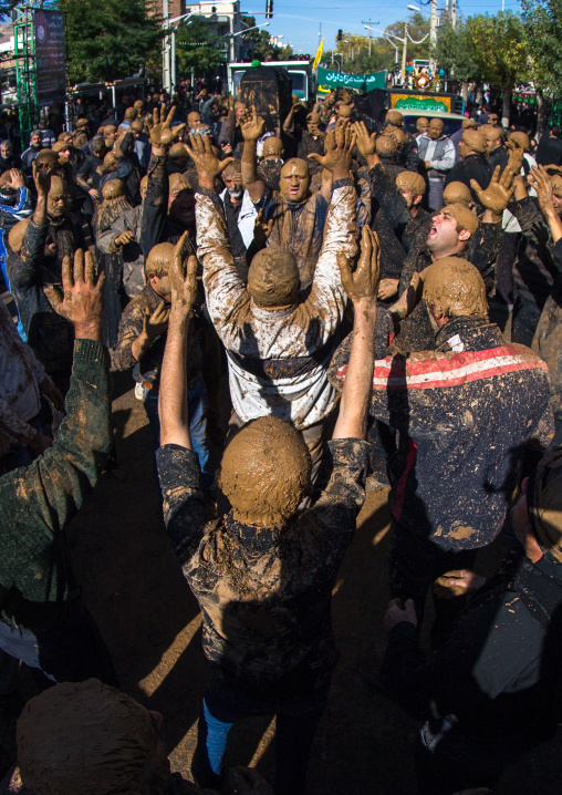 Iranian Shiite Muslim Men Covered In Mud, Chanting And Self-flagellating During Ashura, The Day Of The Death Of Imam Hussein, Kurdistan Province, Bijar, Iran