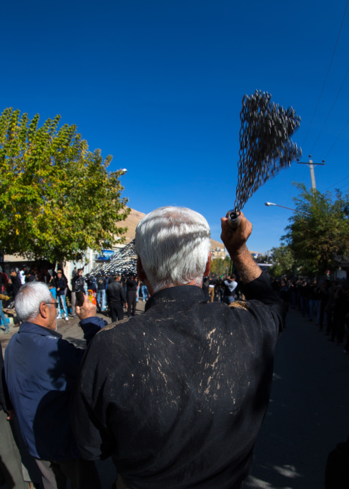 Iranian Shiite Men Are Beating Themselves With Iron Chains To Commemorate Ashura, The Day Of The Death Of Imam Hussein, Kurdistan Province, Bijar, Iran