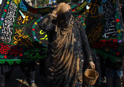Iranian Shiite Muslim Woman Putting Mud On Her Head During Ashura, The Day Of The Death Of Imam Hussein, Kurdistan Province, Bijar, Iran