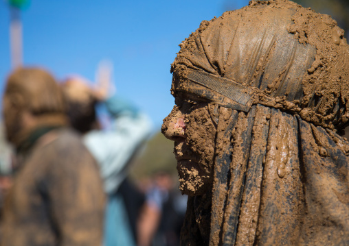 Iranian Shiite Muslim Woman Covered In Mud During Ashura, The Day Of The Death Of Imam Hussein, Kurdistan Province, Bijar, Iran