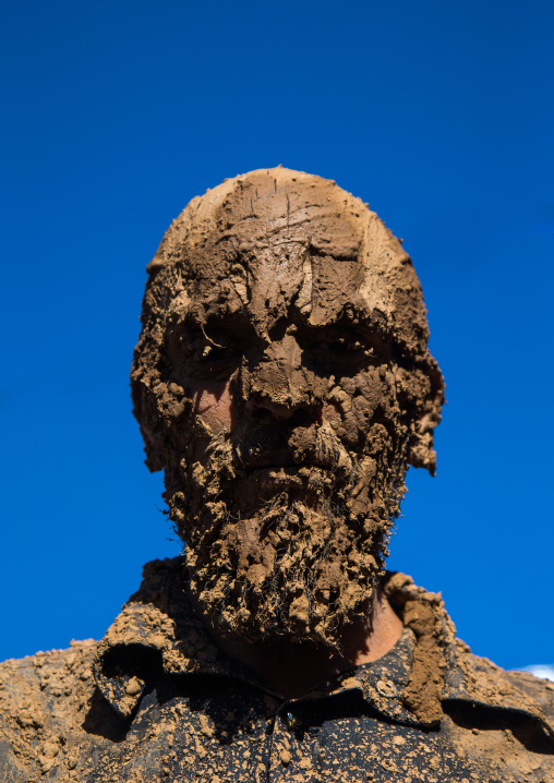 Iranian Shiite Muslim Man Covered In Mud During Ashura, The Day Of The Death Of Imam Hussein, Kurdistan Province, Bijar, Iran