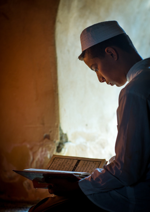 Iranian Shiite Muslim Student Reading The Koran In A Madrassah, Golestan Province, Karim Ishan, Iran