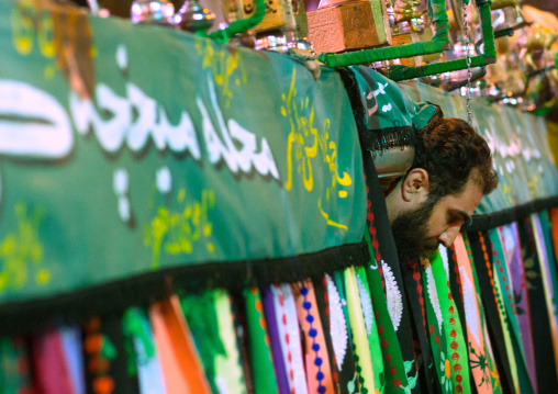 An Iranian Man Carries An Alam On Ashura, The Day Of The Death Of Imam Hussein, Golestan Province, Gorgan, Iran