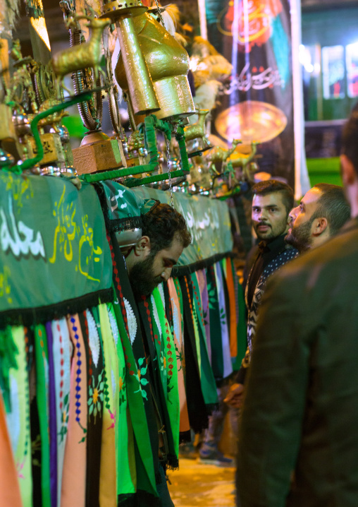 An Iranian Man Carries An Alam Is Helped By Shiite Muslim Mourners To Keep His Balance On Ashura, The Day Of The Death Of Hussein, Golestan Province, Gorgan, Iran