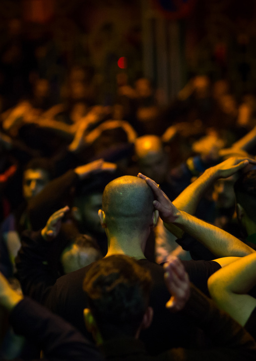 Iranian Shiite Muslim Men Chanting And Self-flagellating During Ashura, The Day Of The Death Of Imam Hussein, Golestan Province, Gorgan, Iran