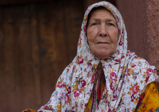 Portrait Of An Iranian Woman Wearing Traditional Floreal Chador In Zoroastrian Village, Isfahan Province, Abyaneh, Iran