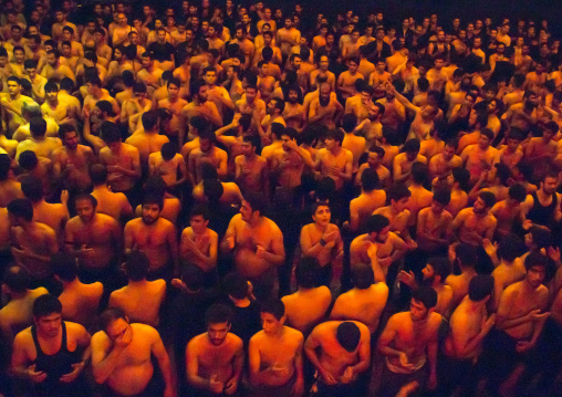 Iranian Shiite Muslim Mourners From The Mad Of Hussein Community Chanting And Self-flagellating During Muharram, Isfahan Province, Kashan, Iran