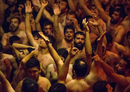 Iranian Shiite Muslim Mourners From The Mad Of Hussein Community Chanting And Self-flagellating During Muharram, Isfahan Province, Kashan, Iran
