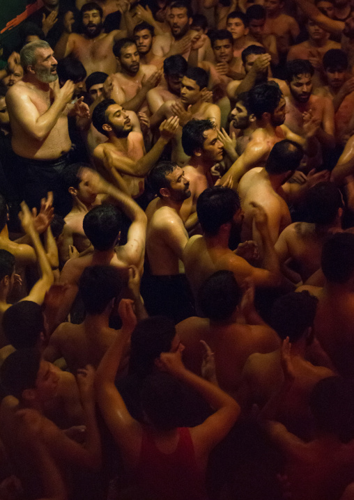 Iranian Shiite Muslim Mourners From The Mad Of Hussein Community Chanting And Self-flagellating During Muharram, Isfahan Province, Kashan, Iran