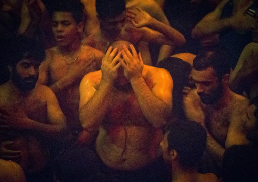Iranian Shiite Muslim Mourners From The Mad Of Hussein Community Chanting And Self-flagellating During Muharram, Isfahan Province, Kashan, Iran