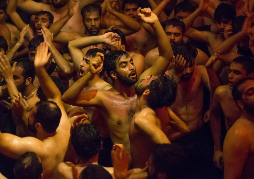 Iranian Shiite Muslim Mourners From The Mad Of Hussein Community Chanting And Self-flagellating During Muharram, Isfahan Province, Kashan, Iran