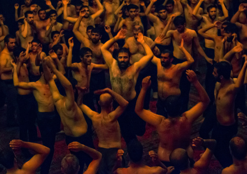 Iranian Shiite Muslim Mourners From The Mad Of Hussein Community Chanting And Self-flagellating During Muharram, Isfahan Province, Kashan, Iran