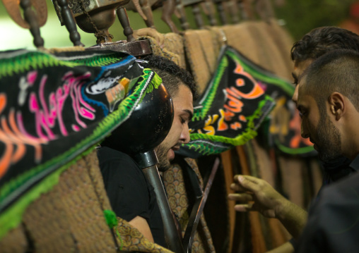 An Iranian Man Carries An Alam Is Helped By Shiite Muslim Mourners To Keep His Balance On Ashura, The Day Of The Death Of Hussein, Isfahan Province, Kashan, Iran