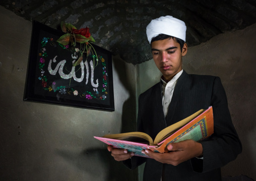 Iranian Shiite Muslim Student Reading The Koran In A Madrassah, Golestan Province, Karim Ishan, Iran