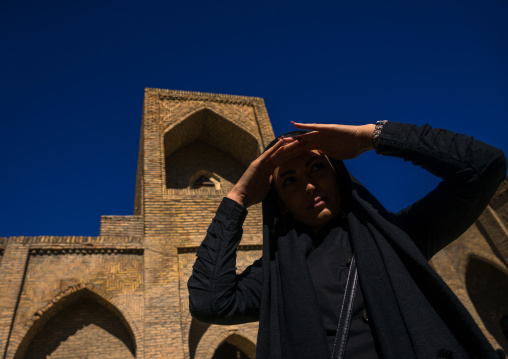 Veiled Iranian Woman In The Courtyard Of An Old Caravanserai Turned Into Madrassah, Golestan Province, Karim Ishan, Iran