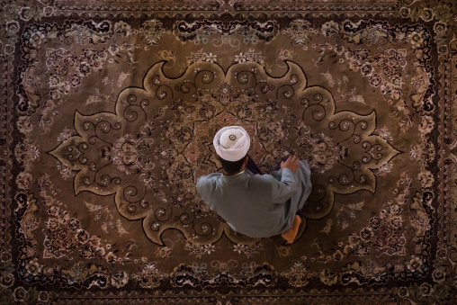 Iranian Shiite Muslim Kneeling And Praying In Mosque, Golestan Province, Karim Ishan, Iran