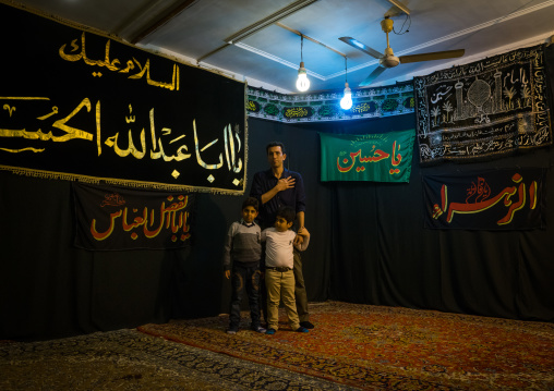 Iranian Shiite Muslim Father And Children During Muharram Before Ashura Celebrations, Golestan Province, Gorgan, Iran