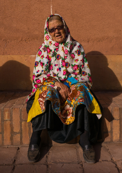 Portrait Of An Iranian Woman Wearing Traditional Floreal Chador In Zoroastrian Village, Isfahan Province, Abyaneh, Iran
