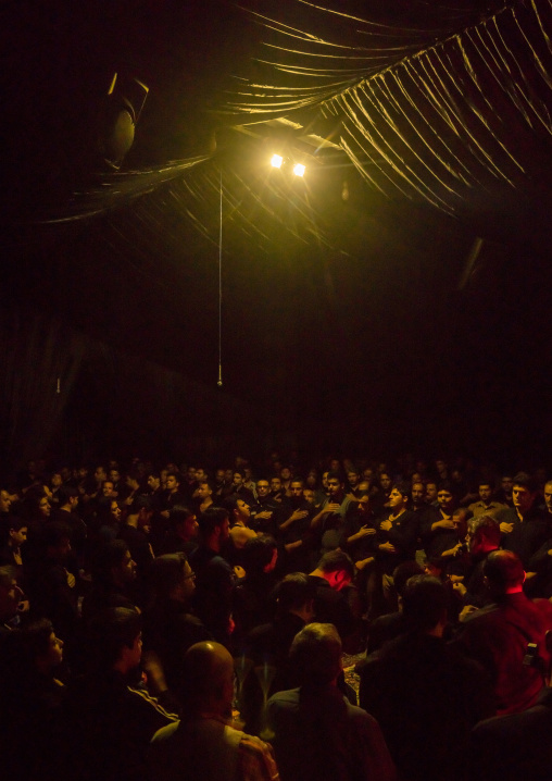 Iranian Shiite Muslim Men In A Mosque Chanting And Self-flagellating During Ashura, The Day Of The Death Of Imam Hussein, Isfahan Province, Kashan, Iran