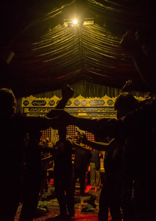 Iranian Shiite Muslim Men In A Mosque Chanting And Self-flagellating During Ashura, The Day Of The Death Of Imam Hussein, Isfahan Province, Kashan, Iran