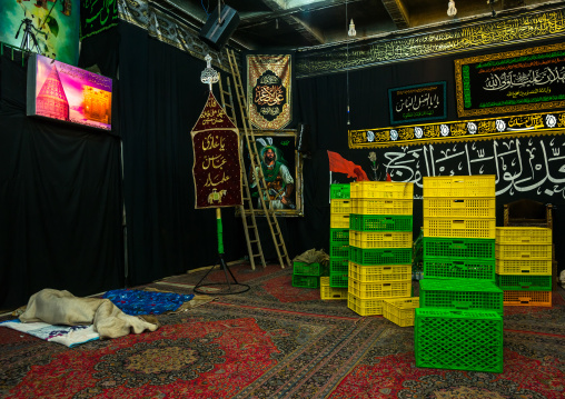 Shiite Muslim Man Sleeping In The Mad Of Hussein Community House During Muharram, Isfahan Province, Kashan, Iran