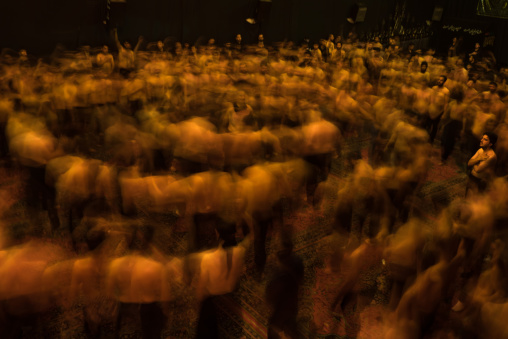 Iranian Shiite Muslim Mourners From The Mad Of Hussein Community Chanting And Self-flagellating In Circle During Muharram, Isfahan Province, Kashan, Iran