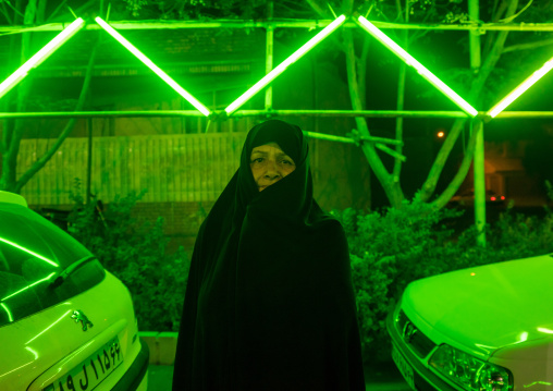 Iranian Shiite Muslim Woman In Green Light During Ashura, The Day Of The Death Of Imam Hussein, Isfahan Province, Kashan, Iran