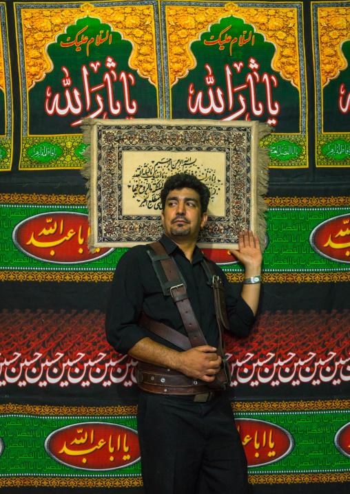 Iranian Shiite Alam Porter During Chehel Menbari Festival On Tasua Day To Commemorate The Martyrdom Of Imam Hussein, Lorestan Province, Khorramabad, Iran