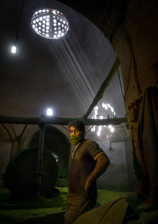 Worker With Green Dust On His Face In Traditional Henna Mill, Yazd Province, Yazd, Iran
