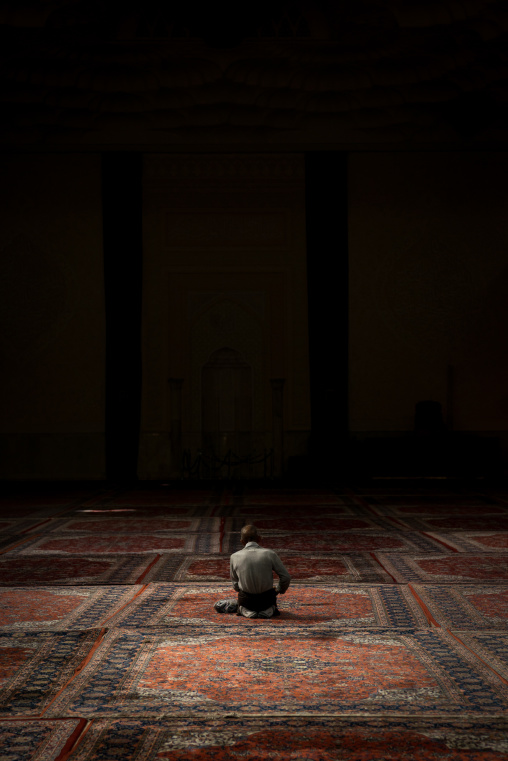 Iranian Shiite Muslim Man Praying In Fatima Al-masumeh Mosque, Fars Province, Shiraz, Iran