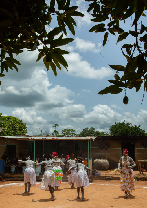 Women dancing during a ceremony in Adjoua Messouma Komians initiation centre, Moyen-Comoé, Aniassue, Ivory Coast