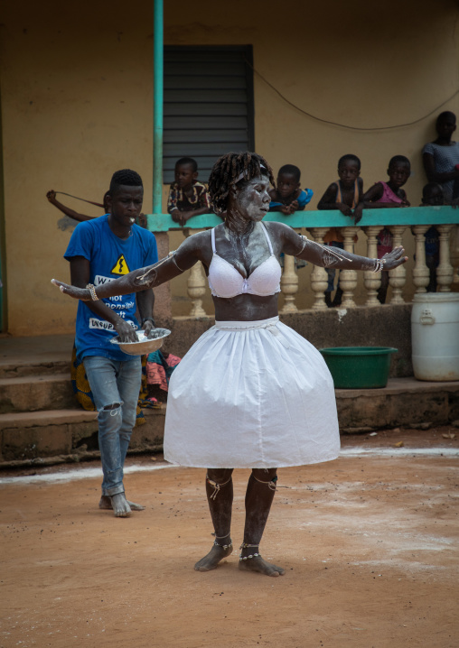 Komian woman dancing during a ceremony in Adjoua Messouma Komians initiation centre, Moyen-Comoé, Aniassue, Ivory Coast