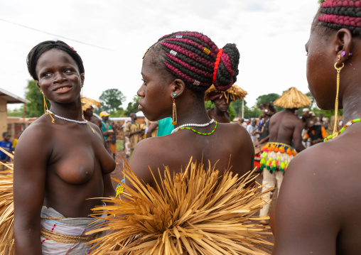 Young Senufo shirtless women dancing the Ngoro during a ceremony, Savanes district, Ndara, Ivory Coast