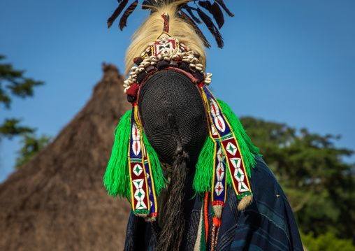 The tall mask dance called Kwuya Gblen-Gbe in the Dan tribe during a ceremony, Bafing, Gboni, Ivory Coast