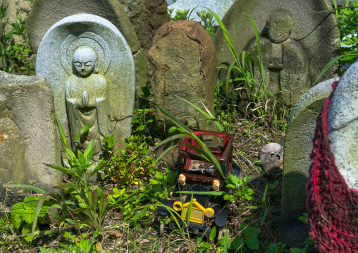 Stone baby statues called jizobosatsu protecting the souls of aborted children after the tsunami, Fukushima prefecture, Tairatoyoma beach, Japan