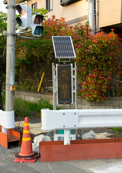 A radiation dosimeter placed inthe difficult-to-return zone after the daiichi nuclear power plant irradiation, Fukushima prefecture, Tomioka, Japan