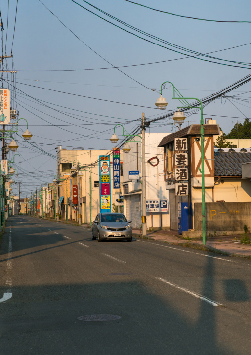 Car passing in the difficult-to-return zone after the daiichi nuclear power plant irradiation, Fukushima prefecture, Tomioka, Japan