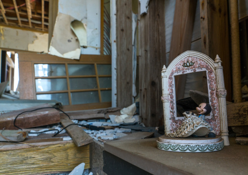 Mickey mouse toy inside a house destroyed by the 2011 earthquake and tsunami five years after, Fukushima prefecture, Namie, Japan